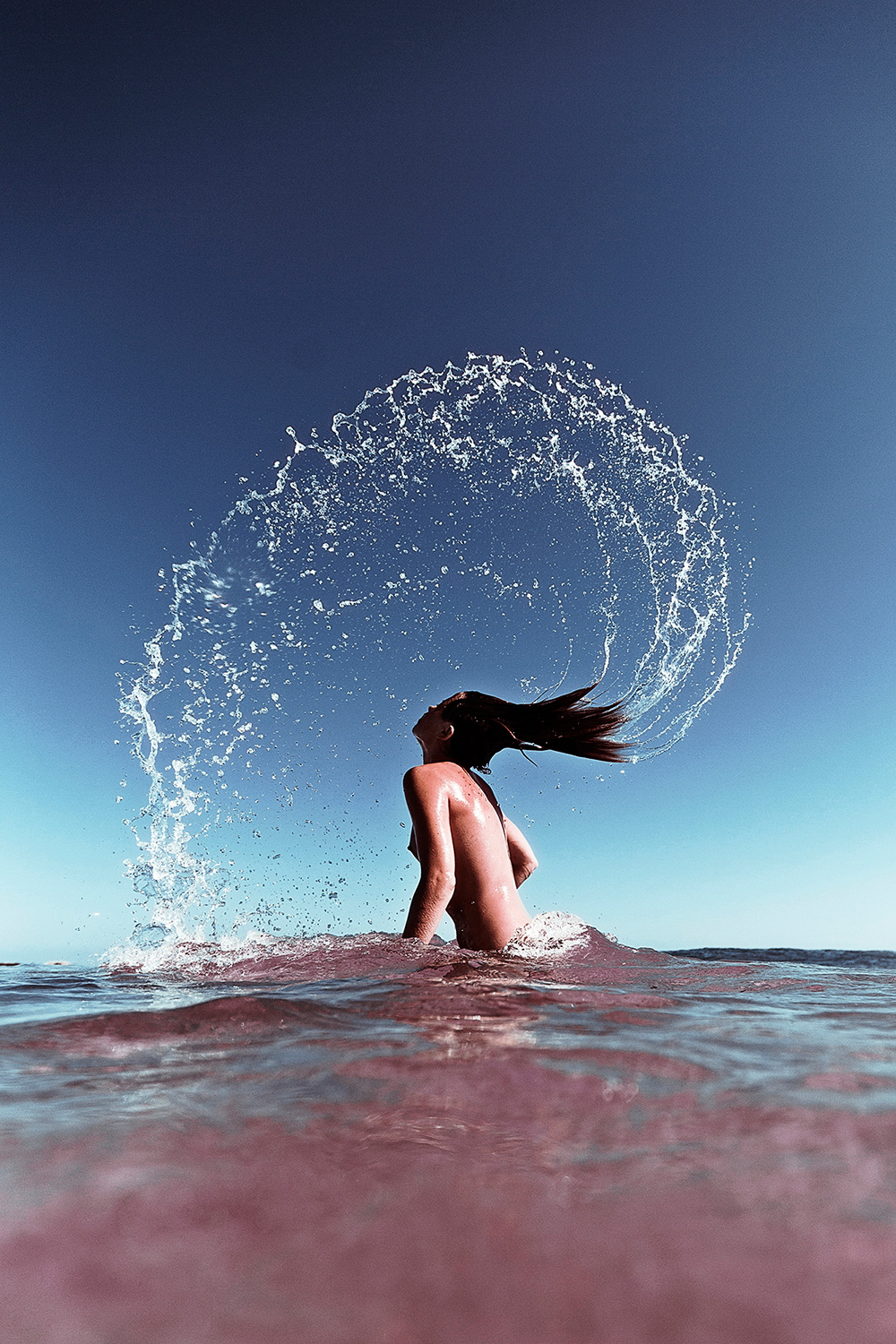 Красота девушек и величие моря на фотографиях Энрика Эдриана Дженера