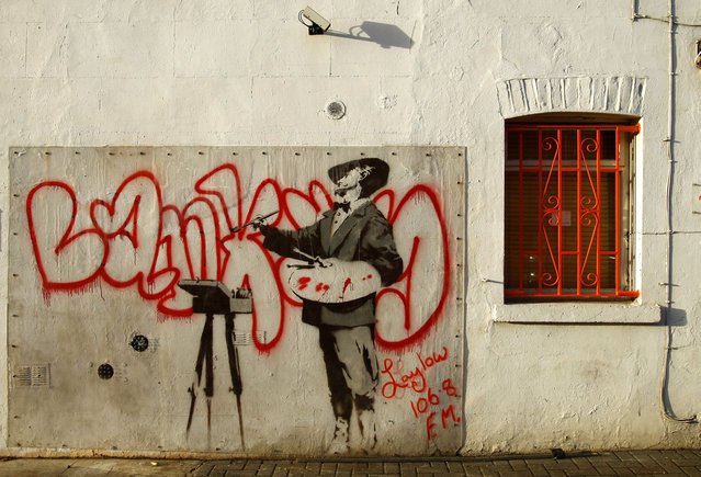 Лучшие работы британского уличного художника Бэнкси