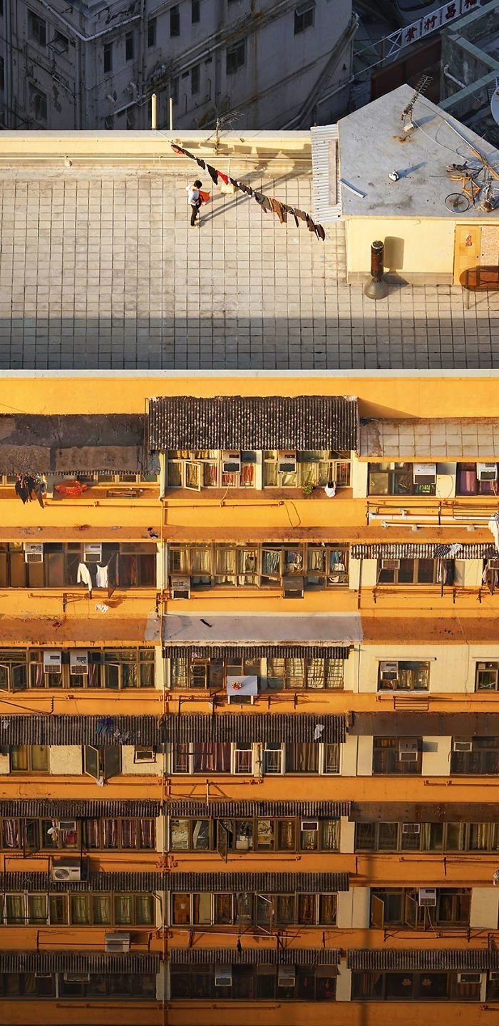 Жизнь на крышах Гонконга от французского фотографа