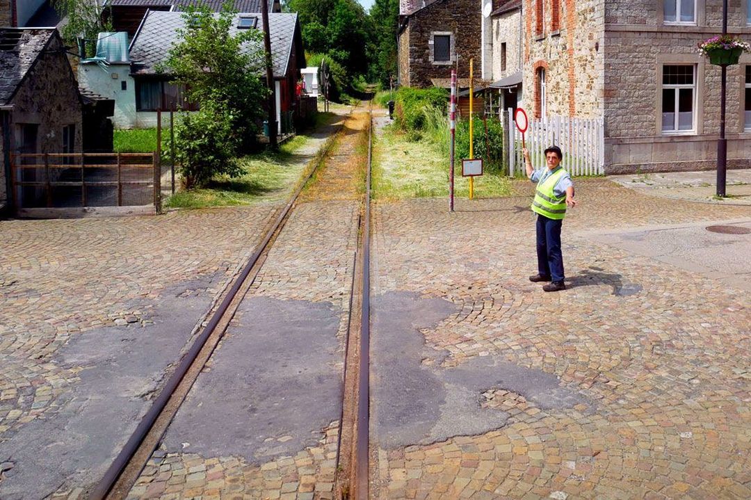 Снимки плохих бельгийских дорог в фотокниге