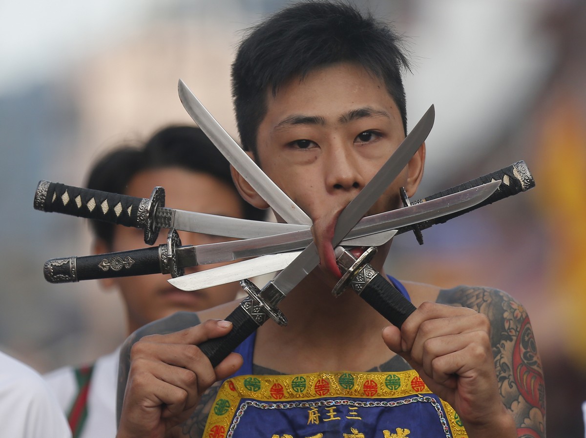 Kilenc istenek császárainak buddhista fesztiválja Thaiföldön