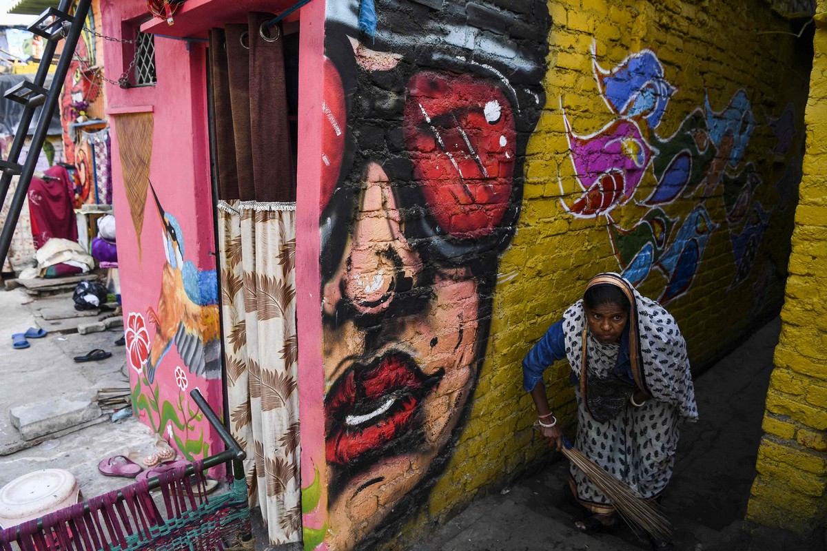 Яркие стрит-арт рисунки в трущобах Нью-Дели