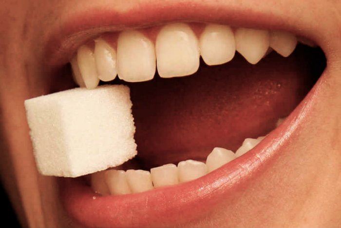Почему зубы болят от сладкого?