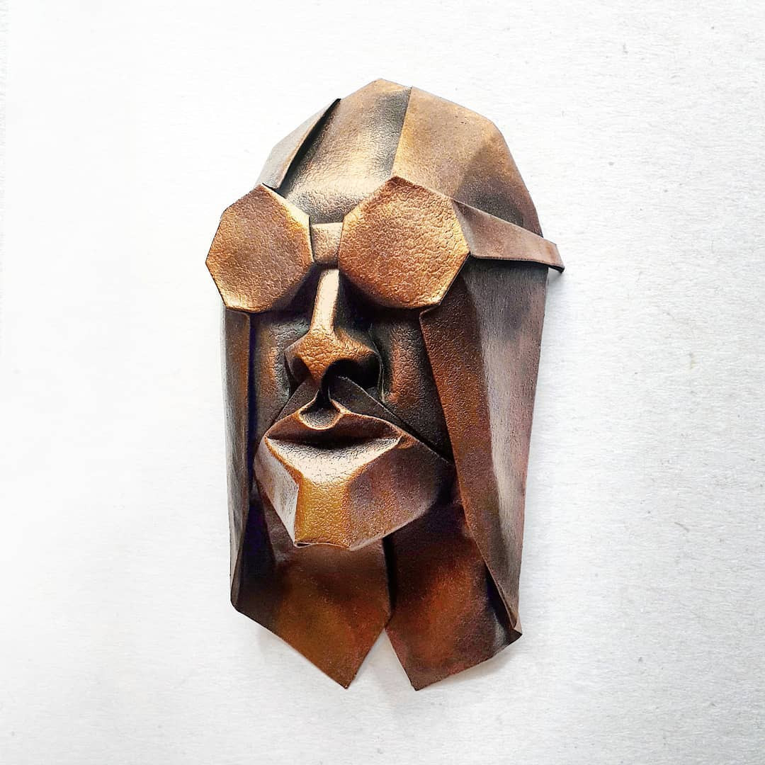 Впечатляющие миниатюрные маски-оригами от Финна Джексона