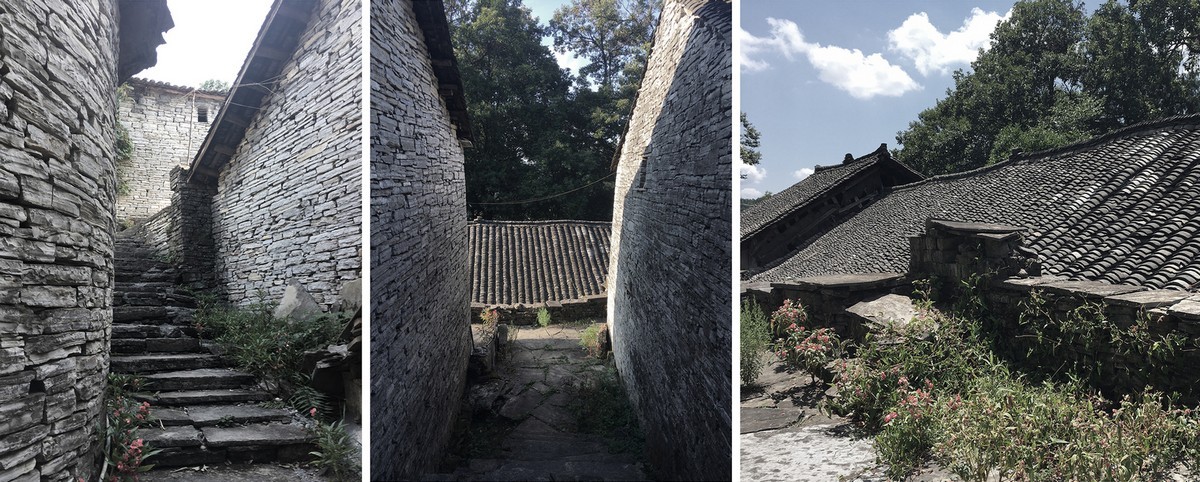 Каменные дома на склоне холма в древней китайской деревне
