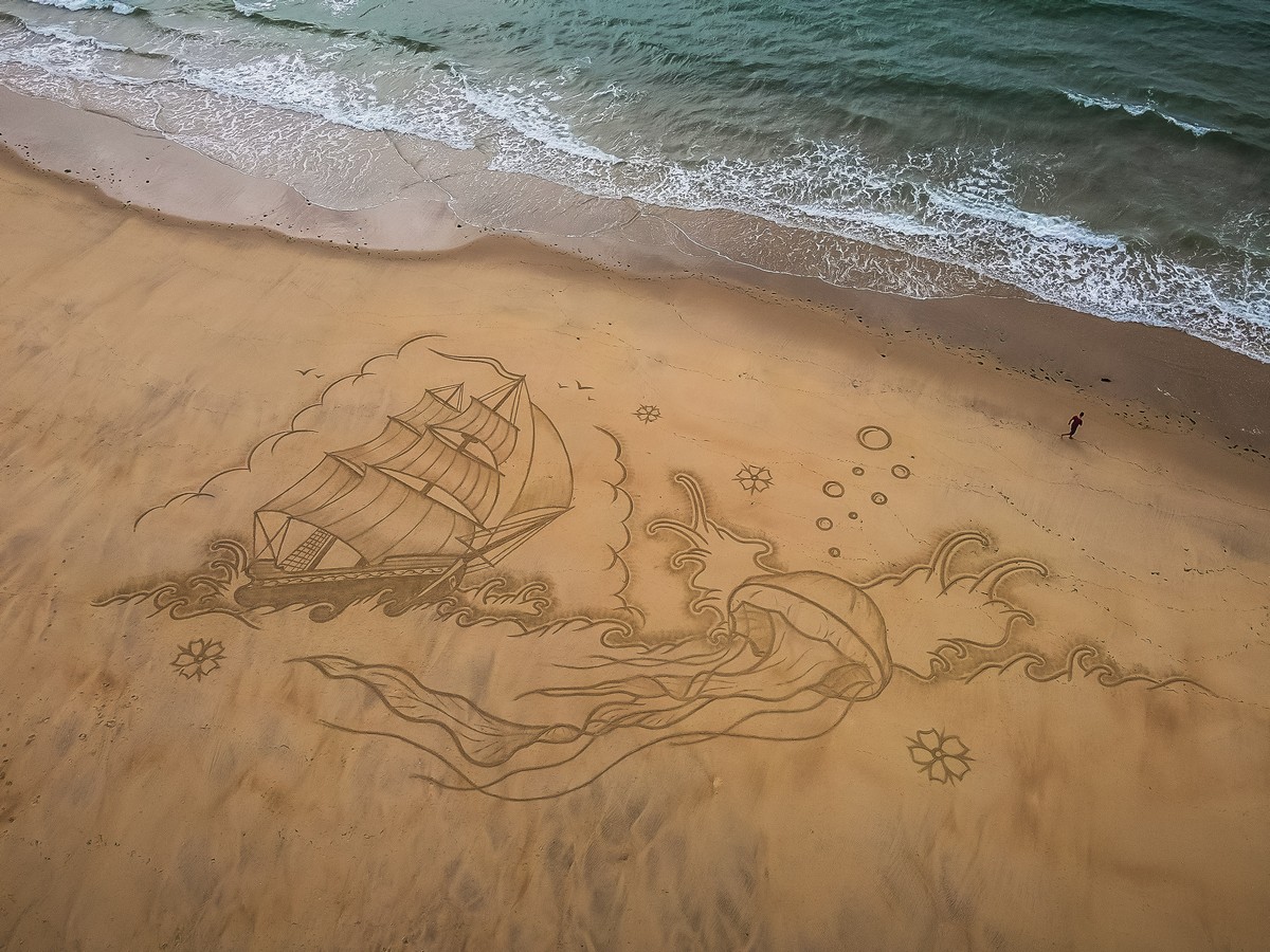 Арт рисунки на песке
